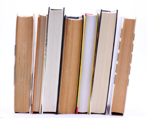 Books are standing upright in a row