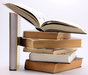 Naklejka premium stack of books with open book