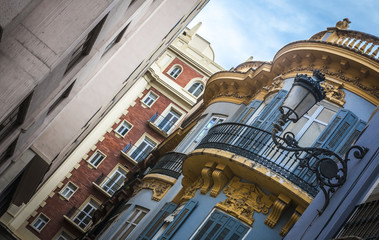 The narrow street with old houses, Granada, Spain.
