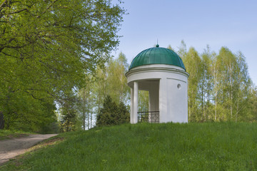 old spring park with stone gazebo