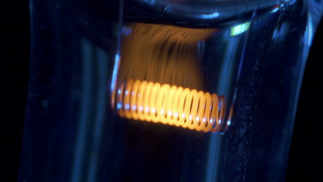 Tungsten filament of electric bulb. Loop.