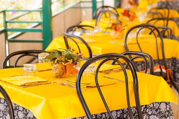 Fotobehang Yellow tablecloth © Dario Lo Presti