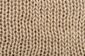 close up brown knitted pullover background
