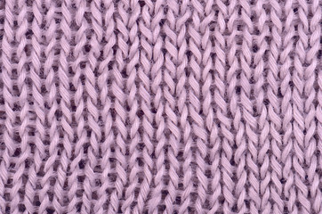 close up pink knitted pullover background