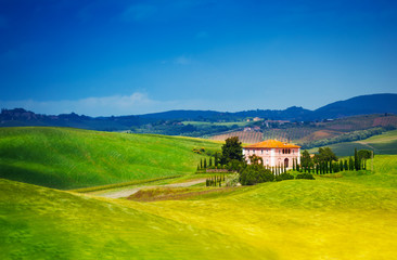 Fototapeta na wymiar Beautiful house in Tuscany landscape, Italy