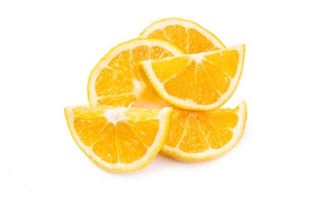scattered slices of orange on a white background