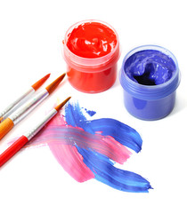 Abstract gouache paint, cans  and brushes, isolated on white