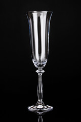 empty glass for champagne isolated on black