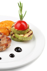 Grilled steak and grilled vegetables on plate, isolated on