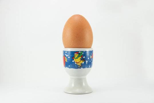 Brown egg on christmas holder