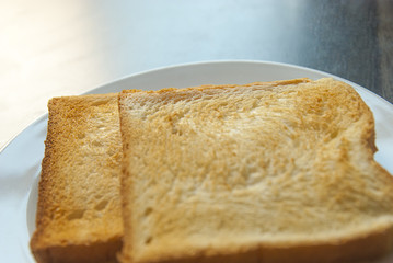 Slices of toast on wood table