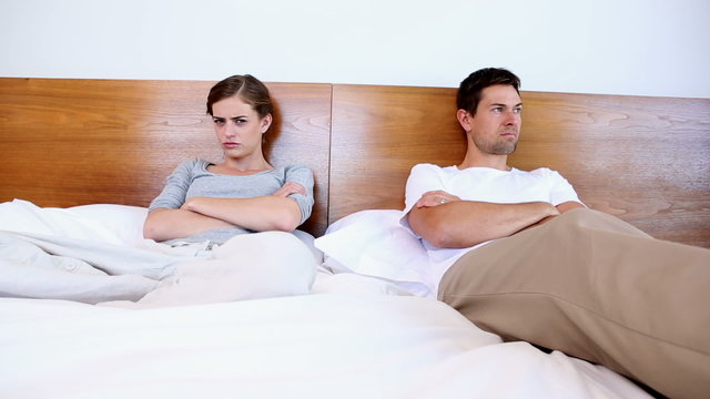 Unhappy couple not talking after argument