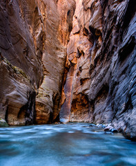 Virgin River flows through The Narrows of Zion Canyon National p