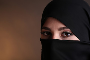 Naklejka premium Beautiful muslim arabic woman in paranja