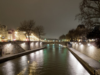 Fototapeta na wymiar Arch bridge across a river, Pont Neuf, Seine River, Paris, Franc