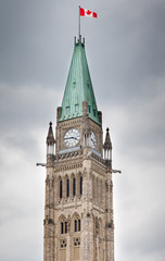 Fototapeta na wymiar Clock tower in a parliament building, Peace Tower, Centre Block,