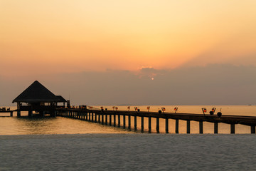 Scenery of hte calm dusk with a long bridge,Maldives