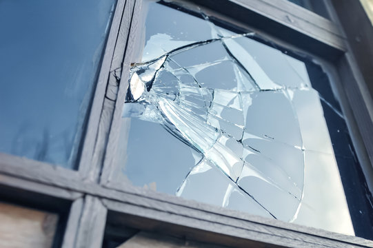 broken glass in a window frame