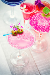 Cocktail with caviar and flower