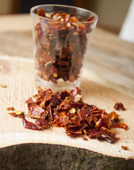 Dry chilly close up on wooden background