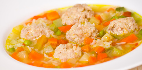 Soup with meatballs, rice and vegetables