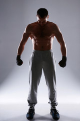 Full length portrait of a boxer preparing for training