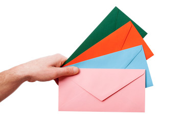 Colorful envelopes on white background