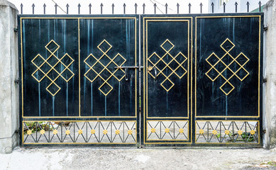 Metal gate with Endless knot symbol