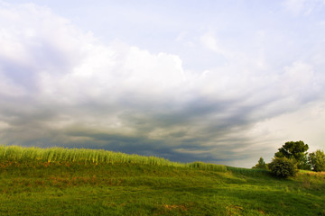 Fototapeta premium Stormy sky rain clouds countryside.