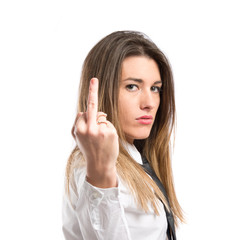 young businesswoman making horn gesture over white background