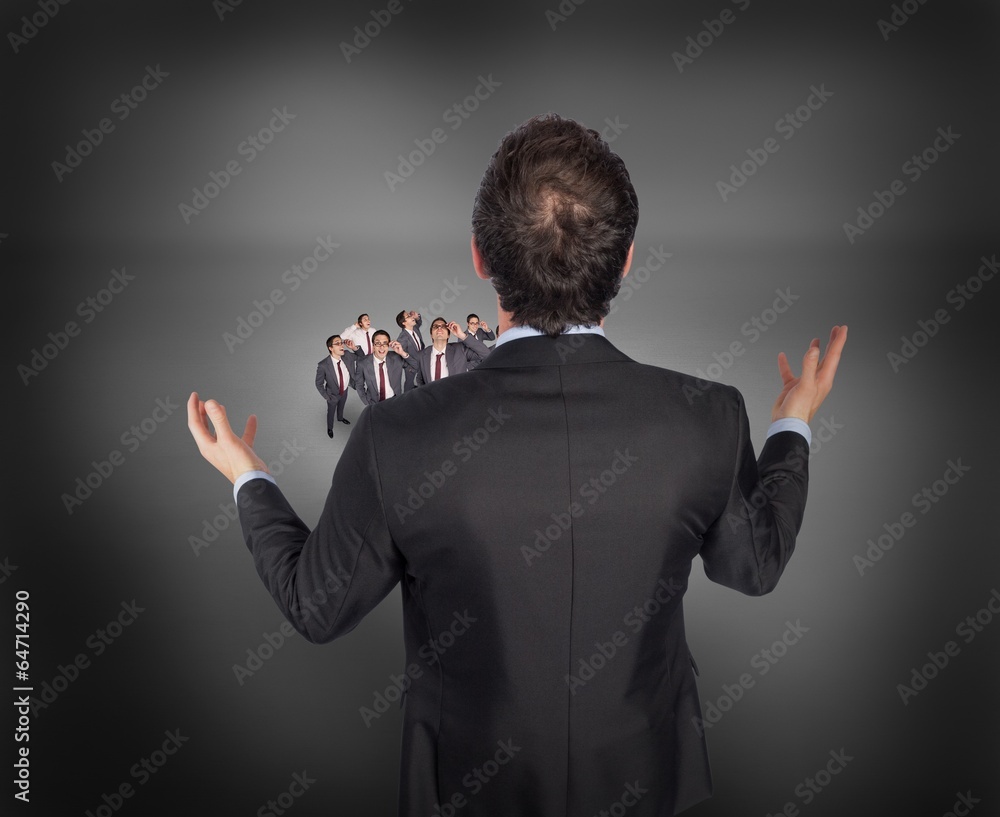 Poster composite image of gesturing businessman with tiny businessmen
