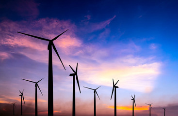 wind turbine silhouette on colorful sunset