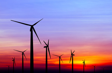 wind turbine silhouette on colorful sunset