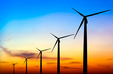 wind turbine silhouette on colorful sunset