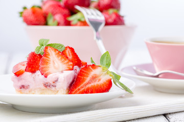 Strawberry cake with coffee or tea.