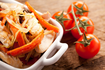Dish with meat and tomato