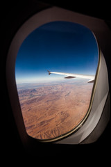 View at the earth from window of airplane