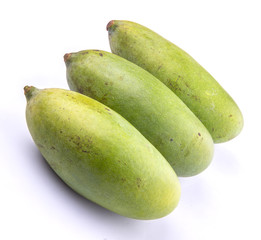 Green mango fruit over white background