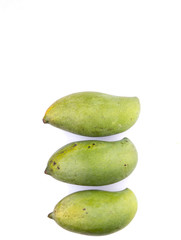 Green mango fruit over white background