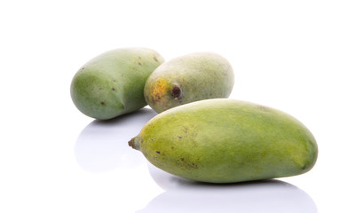 Green mango fruit over white background