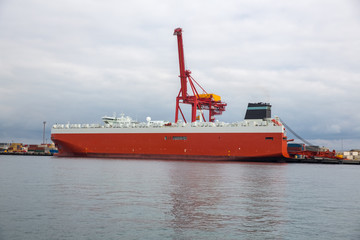 Naklejka premium Cargo ship and containers