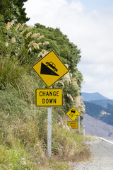 Road sign for motorists Change Down