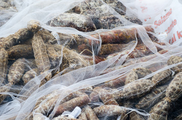 salami in a market under protective net
