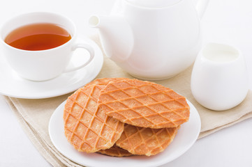 Sweet waffles on white plate