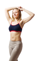 Obraz premium Young female doing exercises on white