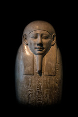 Granite sarcophage of Egyptian pharaoh in black background