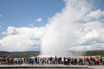 Yellowstone National Park Tourists watching Old Faithful