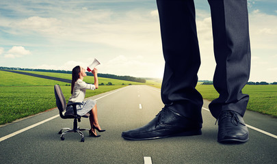 angry woman screaming at big boss