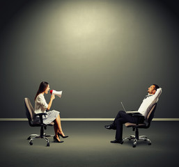 Fototapeta premium smiley man listening angry woman