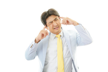 頭痛を訴えるビジネスマン